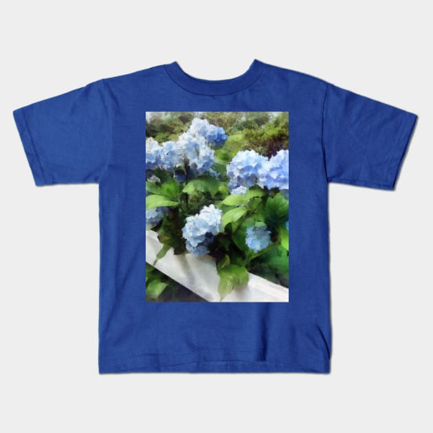 Hydrangea - Blue Hydrangea on White Fence Kids T-Shirt by SusanSavad